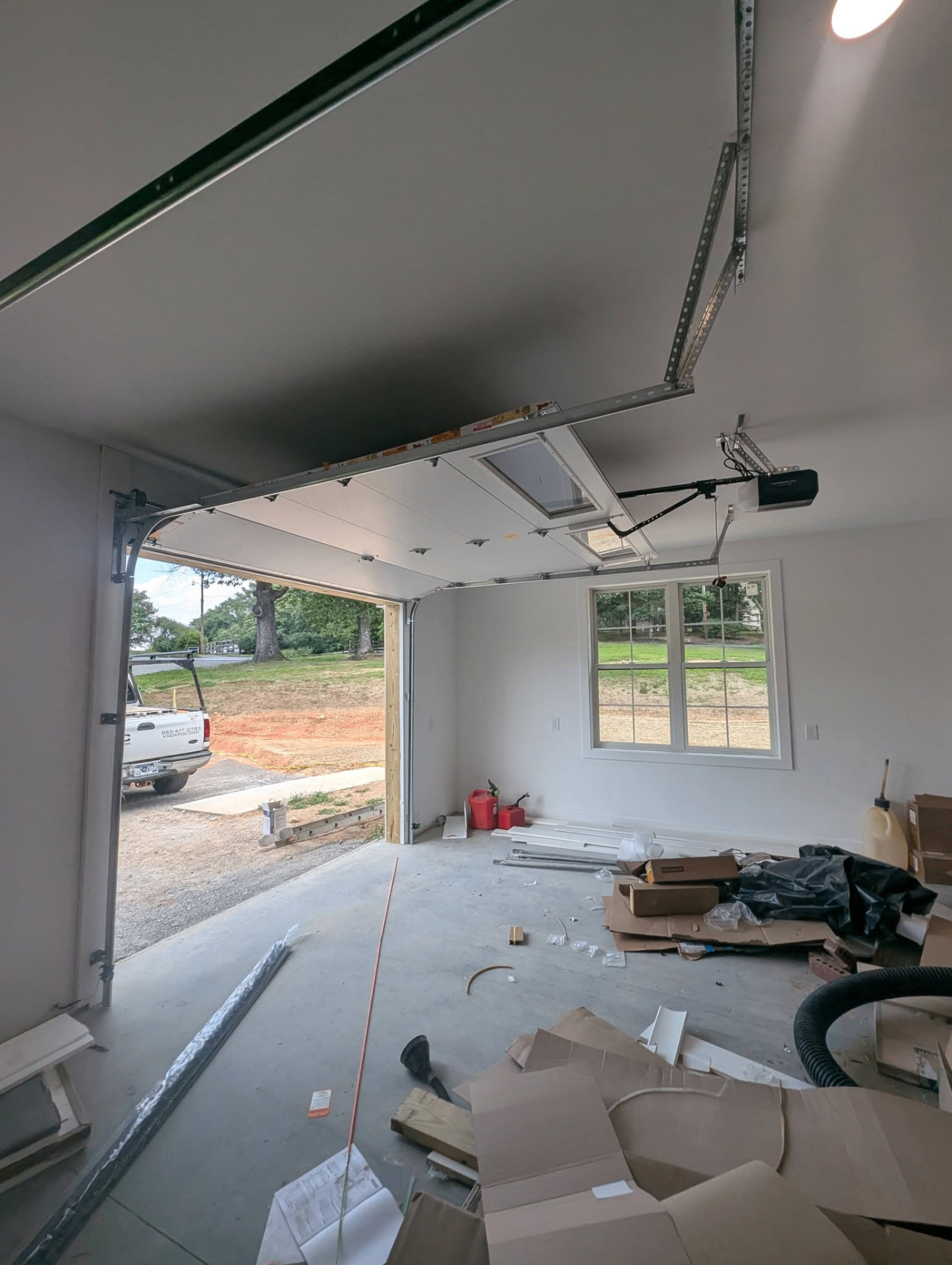 Interior view of new garage door with opener installation