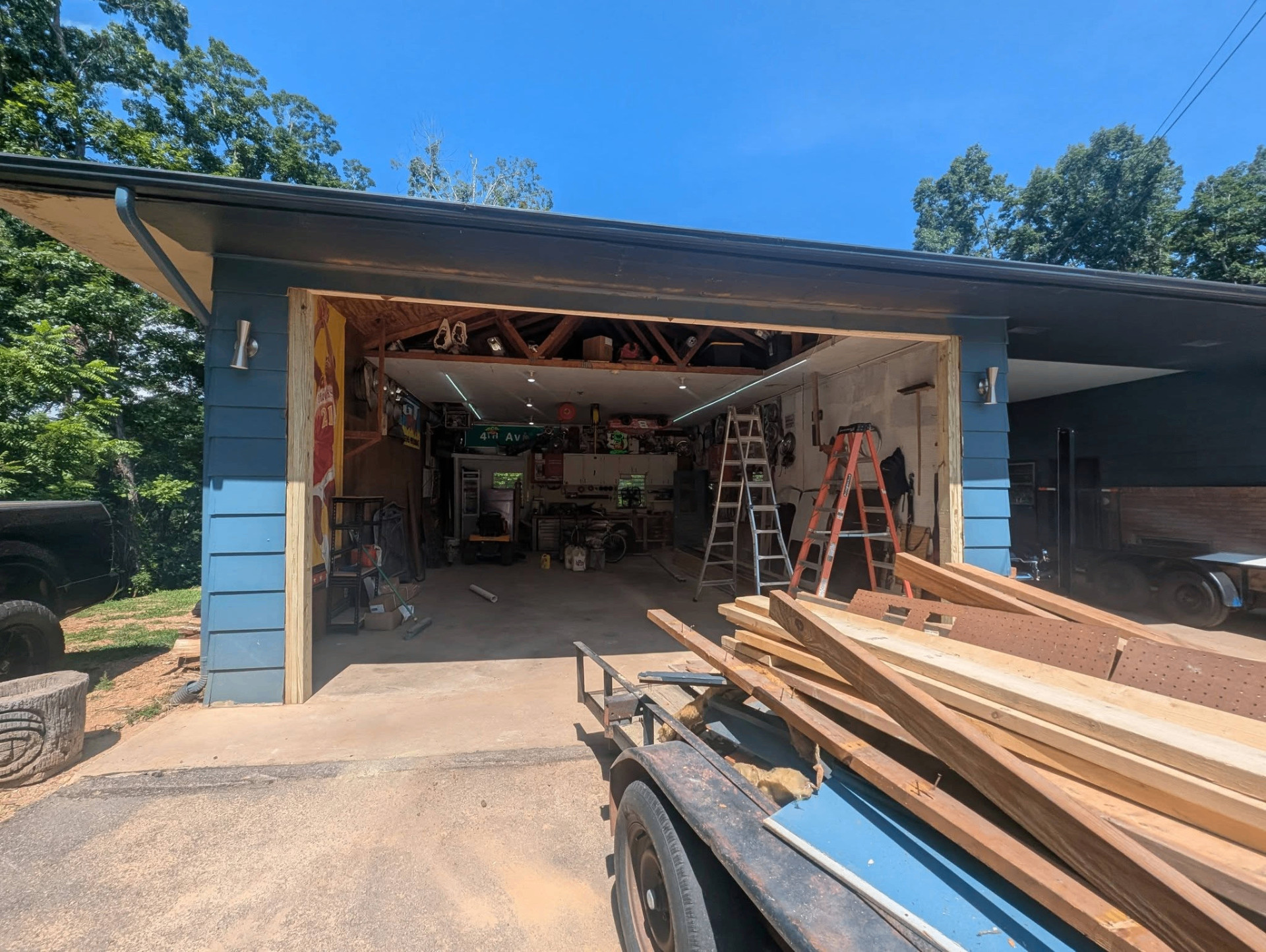 Garage door removal and preparation for new installation